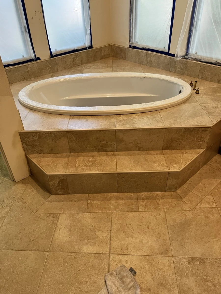 Travertine bathroom floor tile installation — SB Tile Pro, Santa Barbara